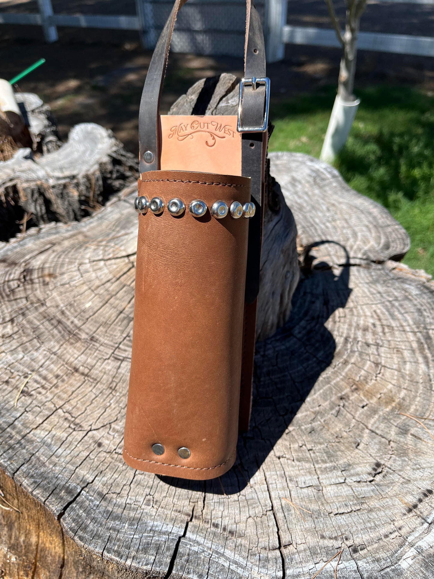 Water Hole: Premium Leather Saddle Drink Holder with dimpled chrome spots