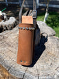 Water Hole: Premium Leather Saddle Drink Holder with dimpled chrome spots